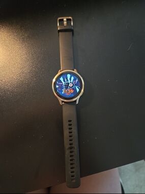 Garmin Black Silicone Smartwatch with Gold-Tone